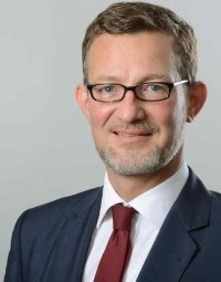 Dr. Gerd Leutner, Licencié en droit